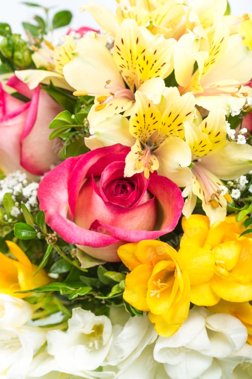 Preview: Colorful bouquet of roses, lilies, and other flowers arranged beautifully for a special occasion