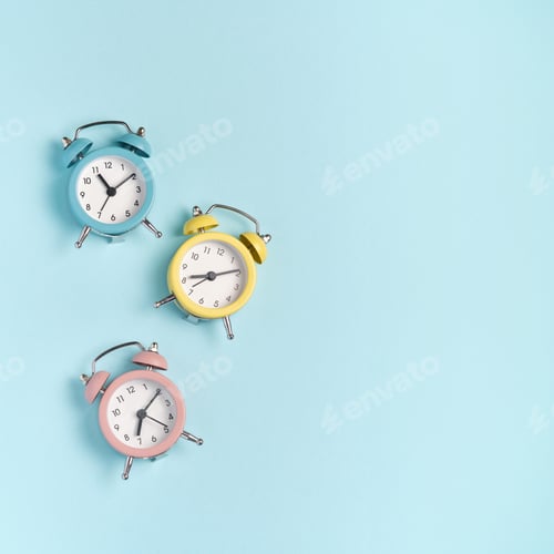 Collection of alarm clocks. Start of the day, waking up, morning, different time zones.