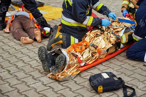 Preview: Rescuers provide first aid to the victim during car road accident