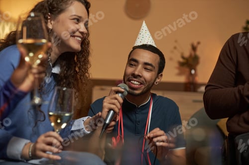 Preview: Man Singing Karaoke to Microphone