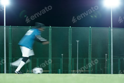 Preview: Blurry motion of contemporary active soccer player