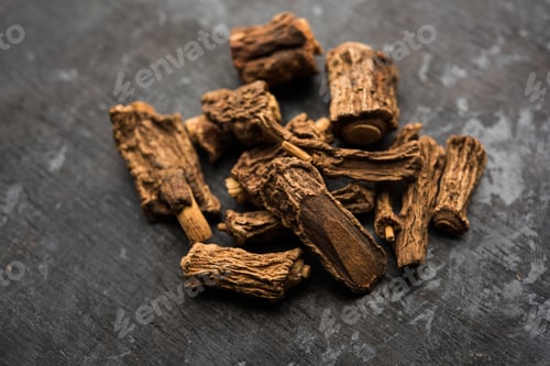 Pile of Culinary Herbs on Dark Background