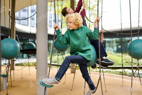 Preview: Joyful moments of childhood in autumn at a vibrant playground