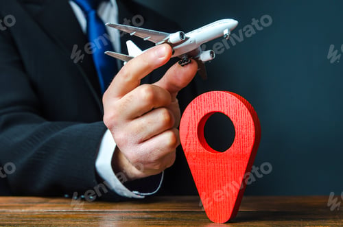 Preview: A plane taking off in the hands of a businessman and a pin location symbol.