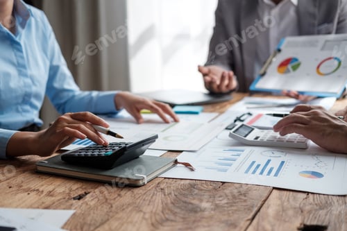 Preview: A group of business people are meeting to analyze data for marketing plan