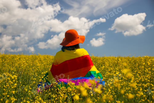 Preview: Young woman with LGBT flag.