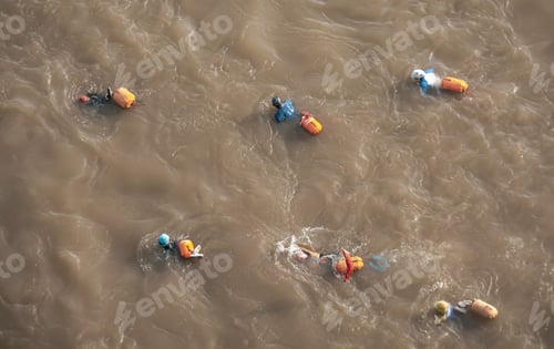 Preview: Top down of a group of elderly people swimming by the Yangtze River in Wuhan, crossing the river