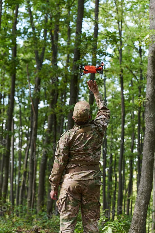 Preview: Elite military unit, equipped with state-of-the-art technology including a drone, strategically