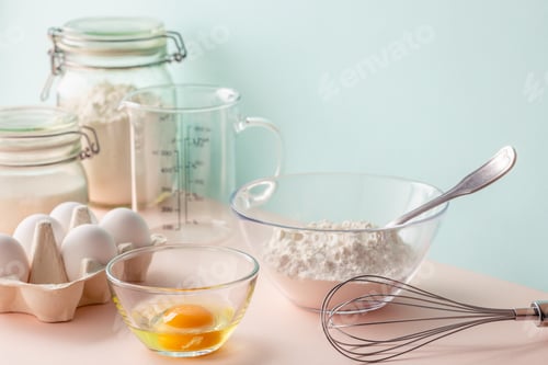Preview: Cooking ingredients for dough, eggs, flour, sugar.