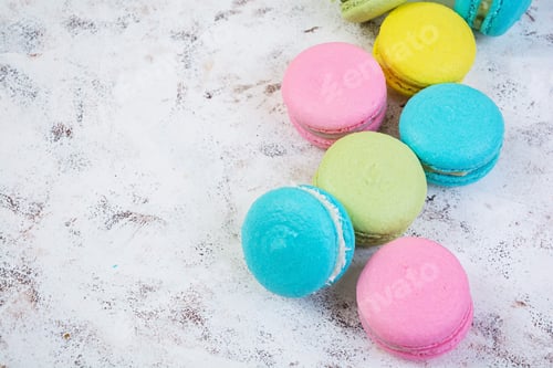 Preview: Delicious colorful macaron cakes on wooden background