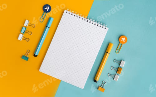 Preview: School supplies. Orange and blue colors. Empty notebook. Flat lay composition. Space for text.