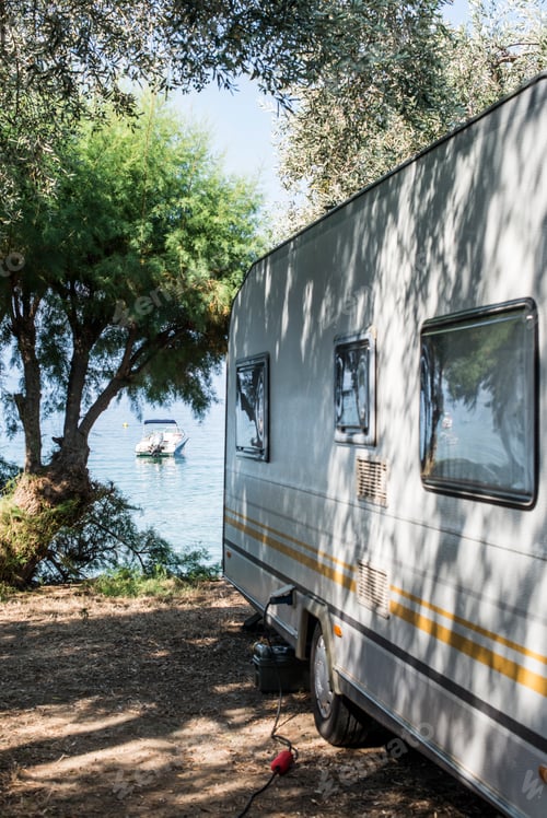 Preview: Greece, Kala Nera, caravan under olive tree at the sea