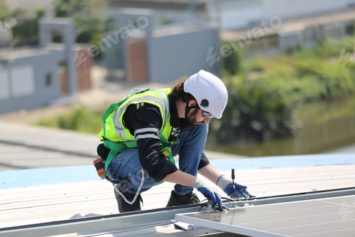 Preview: Engineer service check installation solar cell on the roof of factory. technician checks solar cell.