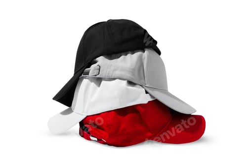Preview: Folded Baseball Caps in Red, Black, White and Grey on a White Background