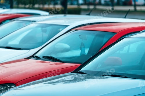 Preview: A lot of cars on street parking, crowded urban environment