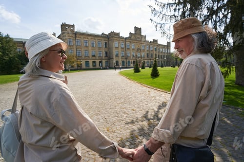 Preview: Loving couple walking together in the yard
