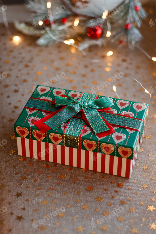 Preview: Christmas or new year red and green gift box with decoration
