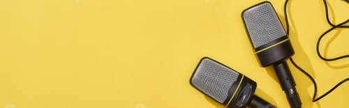Preview: panoramic shot of microphones on bright and colorful background