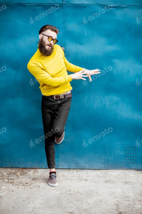 Preview: Portrait of a stylish man on the colorful background