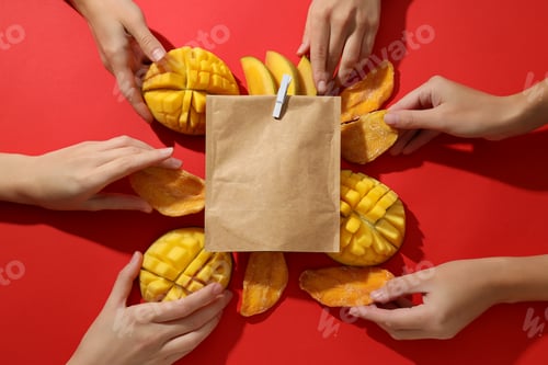 Preview: A paper bag with fresh and dried mangoes