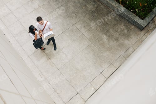 Preview: Business people reading report