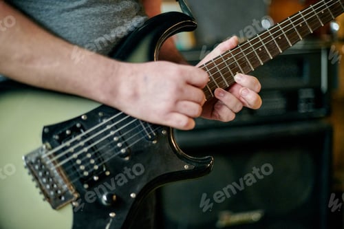 Preview: Guitarist Playing Electric Bass Guitar Close Up