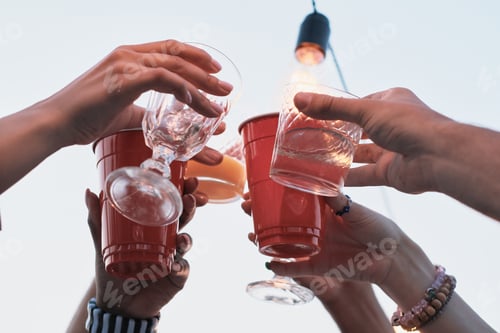 Preview: People toasting with cocktails
