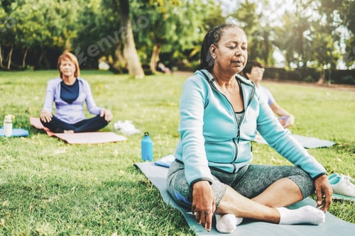 Preview: Meditation, Senior people enjoy yoga meditation training in nature park
