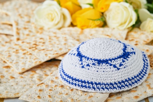 Preview: Passover celebration concept. Matzah, red kosher, white and yellow roses and walnut. Traditional rit