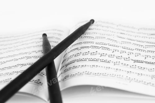 Preview: Drum sticks on the music sheet