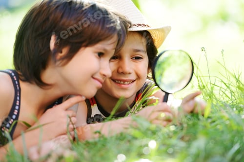Preview: Happy Kid Exploring Nature With Magnifying Glass