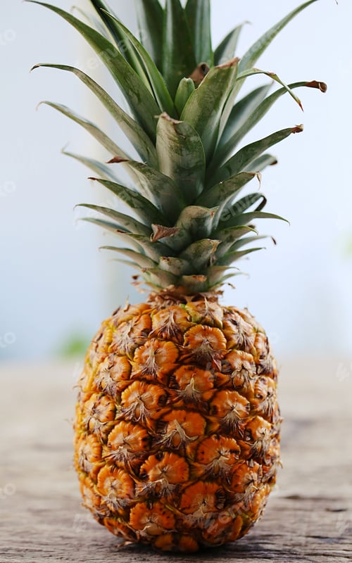 Preview: Closeup Pineapple tropical fruit on wooden table