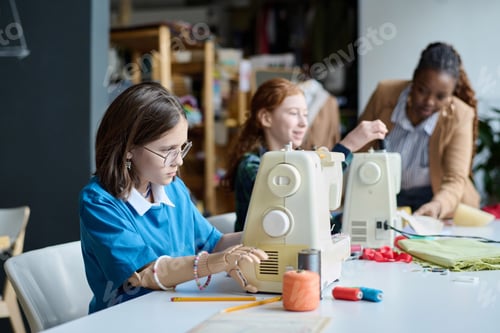 Preview: Girl with disability using sewing machine