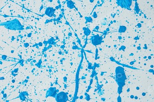 Preview: Blue paint splashes on white canvas as background. Art and creativity