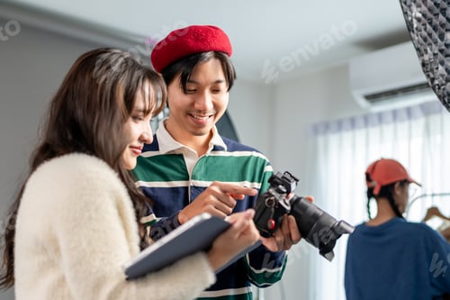 Preview: Behind the scenes of film crew collaborate on set under director's guidance.