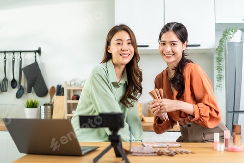 Preview: Asian lesbian vlogger talk with camera to review the cosmetic in kitchen in house