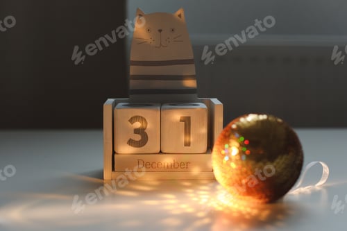 Preview: Wooden cubes calendar and happy new year background, new year greeting card template