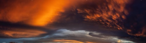 Preview: Dramatic Panoramic View of a cloudscape during a dark and colorful sunset