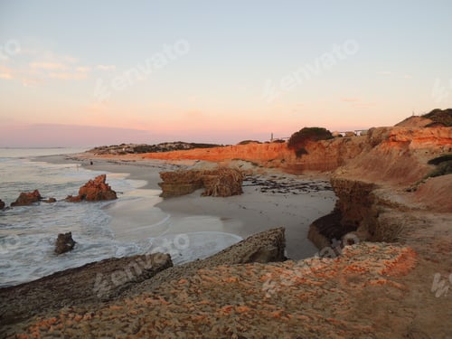 Preview: Scenic coastal landscape at sunset.
