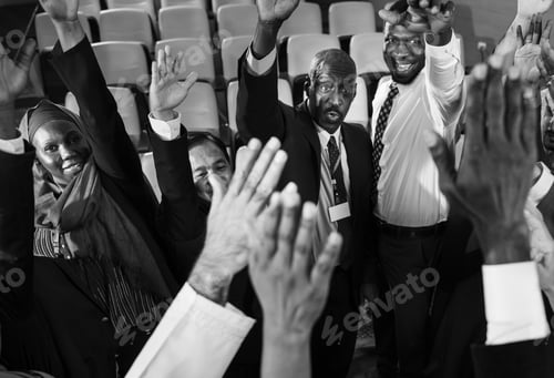 Preview: Group of International Business People Raising Their Hands