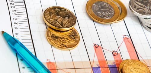 Preview: Financial Chart with Coins and Pen Close Up