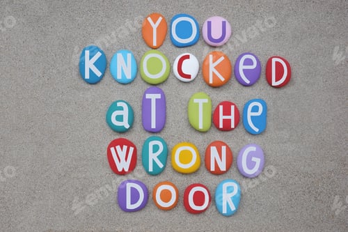 Preview: You knocked at the wrong door, creative text composed with multi colored stone letters