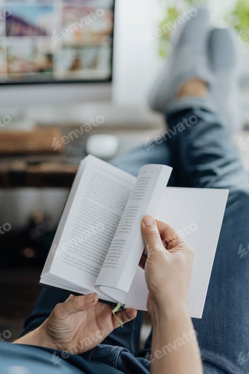 Preview: Man reading a book