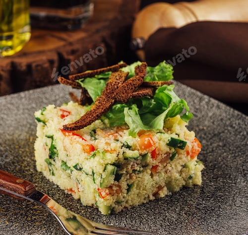 Preview: Couscous with vegetables served in plate