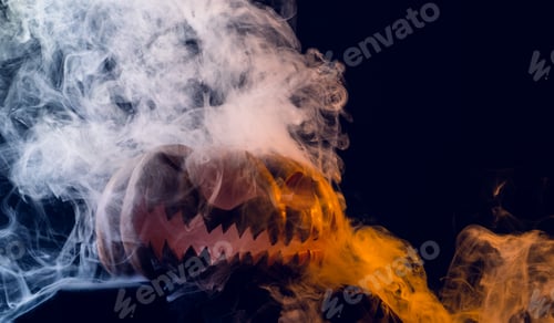 Preview: Composition of halloween carved pumpkin with smoke and orange light on black background