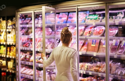Preview: Woman Choosing A Dairy Products At Supermarket