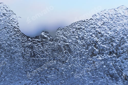Preview: Macro of natural ice texture on glass background