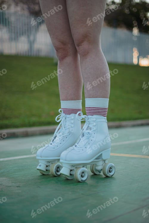 Preview: Legs of girl with roller skates