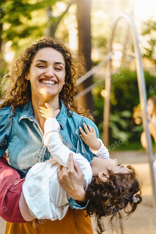 Preview: Mother and Daughter Enjoying Playtime in Park