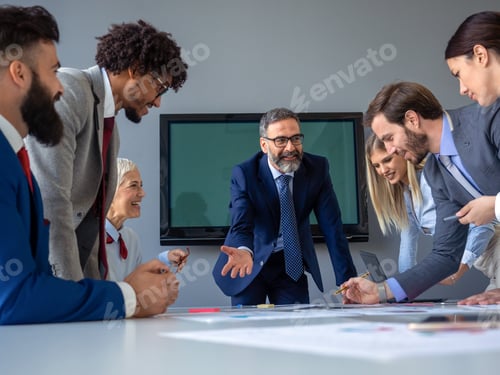 Preview: Group of business people discussing project in the office. Meeting, teamwork concept